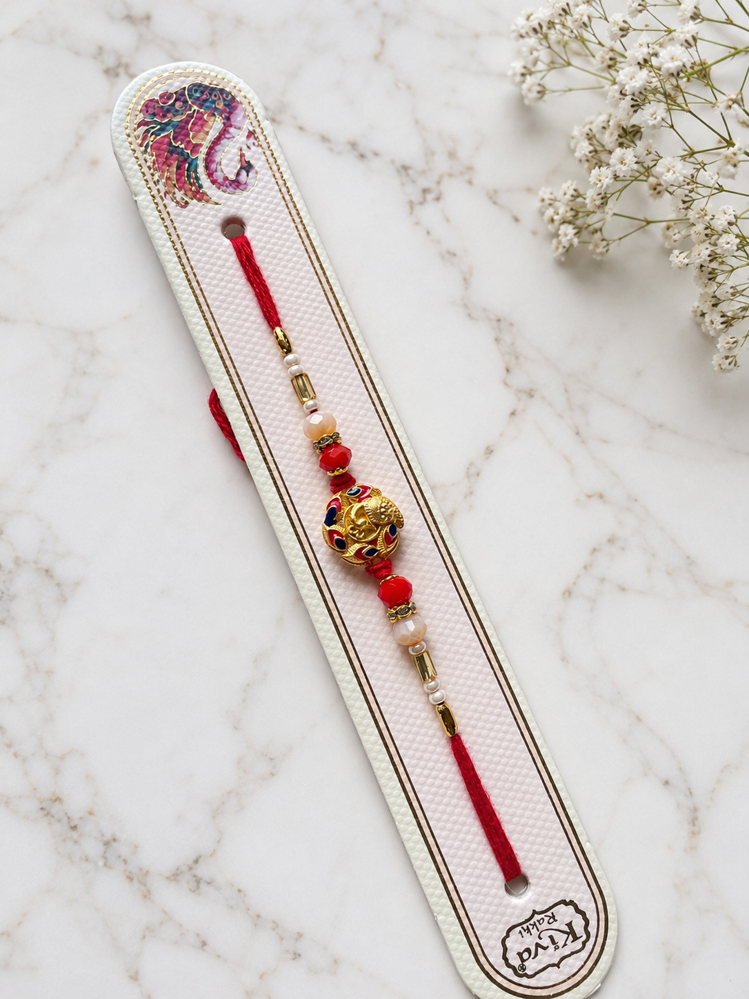 Royal Peacock Kundan Rakhi with Red Thread & Pearl Beads K43